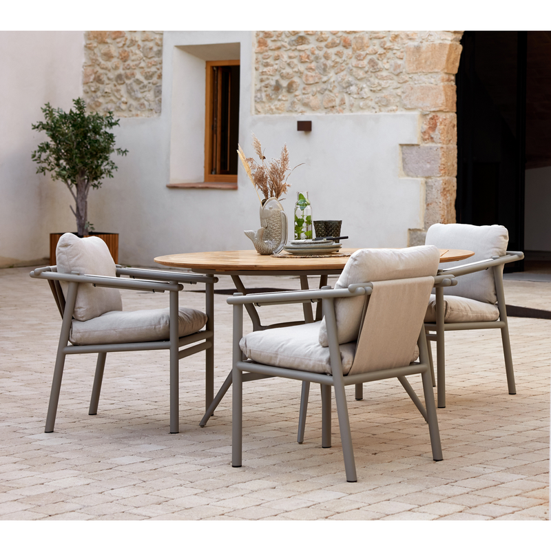 cane line Sticks armchair Taupe aluminium sand cushion lifestyle with round dining table