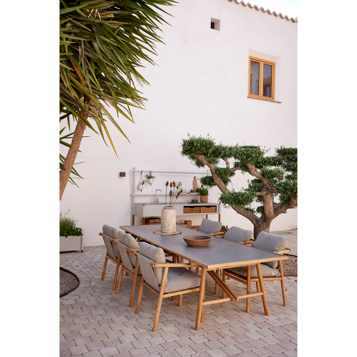 cane-line Sticks dining table teak and taupe table top with dining chair and bench lifestyle