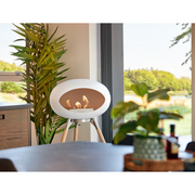 Le Feu White Dome Bioethanol Fireplace ground high polished steel bowl, soaptreated legs and steel burner indoor lifestyle
